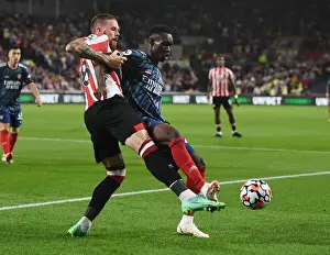Brentford vs Arsenal: Flo Balogun Clashes with Pontus Jansson in Premier League Showdown