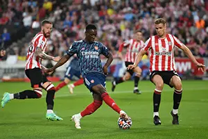 Brentford vs. Arsenal: Flo Balogun's Backheel Battle with Kristoffer Ajer