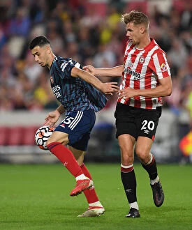 Images Dated 14th August 2021: Brentford vs Arsenal: Gabriel Martinelli Faces Off Against Kristoffer Ajer in Premier League Clash