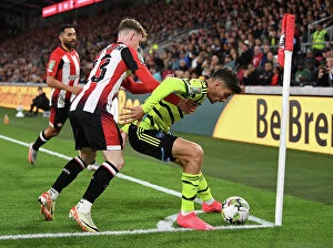 Images Dated 28th September 2023: Brentford vs Arsenal: Kai Havertz Clashes with Keane Lewis-Potter in Carabao Cup Showdown