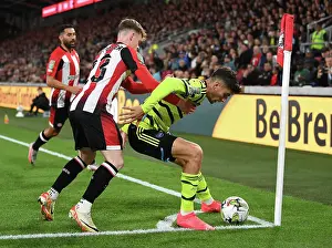 Brentford V Arsenal - Carabao Cup 2023-24 Prints: Brentford vs Arsenal: Kai Havertz Clashes with Keane Lewis-Potter in Carabao Cup Showdown