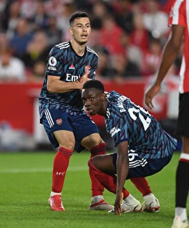 Images Dated 14th August 2021: Brentford vs Arsenal: Martinelli Consoles Distressed Rival Balogun
