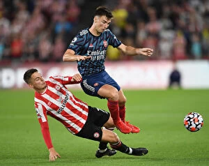 Images Dated 14th August 2021: Brentford vs Arsenal: Tierney Faces Off Against Canos in Premier League Clash