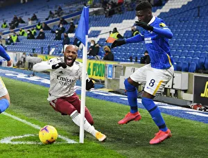 Brighton & Hove Albion vs. Arsenal: Lacazette Fouls Bissouma in Empty American Express Community Stadium - Premier League Clash (December 2020)