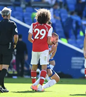 Brighton And Hove Albion V Arsenal 2019-20 Prints: Brighton vs. Arsenal: Clash Between Guendouzi and Maupay Amid Empty Stadiums (2019-20)