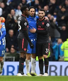 Images Dated 4th March 2018: Brighton vs. Arsenal: Warm Embrace of Sportsmanship - Kolasinac and Schelotto
