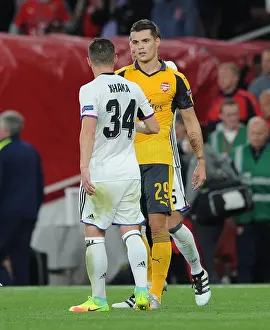 Arsenal V FC Basel 2016-17 Prints: Brothers in Football: A Heartfelt Reunion - Granit and Taulant Xhaka at Arsenal vs