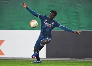 Rapid Vienna V Arsenal 2020-21 Prints: Bukayo Saka in Action: Arsenal vs Rapid Vienna, UEFA Europa League 2020-21