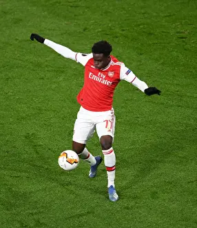 Arsenal V Olympiacos 2019-20 Prints: Bukayo Saka in Action: Arsenal's Star Performance against Olympiacos