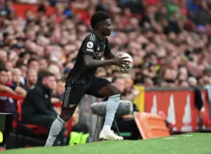 Manchester United V Arsenal 2022-23 Prints: Bukayo Saka in Action: A Football Battle at Old Trafford - Manchester United vs