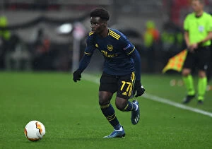 Images Dated 20th February 2020: Bukayo Saka in Action: Olympiacos vs Arsenal, UEFA Europa League Round of 32 - First Leg