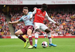Bukayo Saka (Arsenal) John McGinn (Villa)