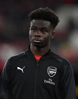 Images Dated 13th December 2018: Bukayo Saka: Arsenal's Promising Talent Ahead of Qarabag Clash in Europa League