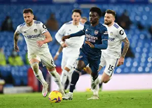 Leeds United V Arsenal 2020-21 Prints: Bukayo Saka Clashes with Leeds Defenders: Arsenal vs Leeds United, Premier League 2020-21