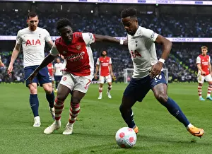 Bukayo Saka Closes In: Intense Battle Between Tottenham's Sessegnon and Arsenal's Saka in Premier League Showdown