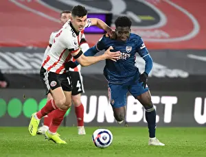 Bukayo Saka Darts Past Sheffield United's John Egan in Empty Bramall Lane - Arsenal vs Sheffield United, Premier League 2020-21