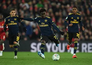 Bukayo Saka Faces Liverpool in Carabao Cup Showdown