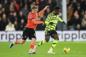 Bukayo Saka Faces Off Against Alfie Doughty: Luton Town vs. Arsenal FC, 2023-24 Premier League Clash