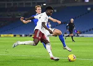 Brighton And Hove Albion V Arsenal 2020-21 Prints: Bukayo Saka Faces Off Against Dan Burn: Brighton vs. Arsenal, Premier League 2020-21