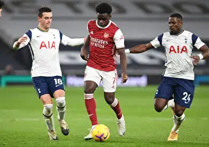 Tottenham Hotspur V Arsenal 2020-21 Prints: Bukayo Saka Faces Off Against Lo Celso and Aurier in Tottenham vs Arsenal Premier League Clash (December 2020)