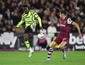 Bukayo Saka Faces Off Against West Ham's Nayef Aguerd in Carabao Cup Clash