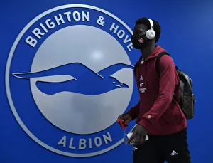Brighton And Hove Albion V Arsenal 2021-22 Prints: Bukayo Saka Gears Up: Arsenal vs. Brighton & Hove Albion, Premier League 2021-22