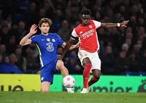 Bukayo Saka Outsmarts Marcos Alonso: A Premier League Showdown at Stamford Bridge, 2021-22