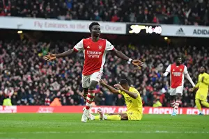 Bukayo Saka Scores His Second Goal: Arsenal's Victory Over Brentford in the 2021-22 Premier League