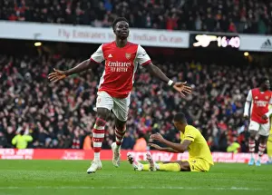 Bukayo Saka Scores His Second Goal: Arsenal's Victory Over Brentford in the 2021-22 Premier League