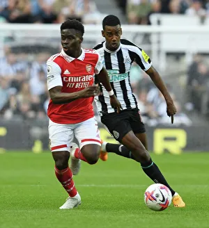 Bukayo Saka vs. Alexander Isak: Intense Battle at St. James Park - Arsenal vs. Newcastle United, Premier League 2022-23