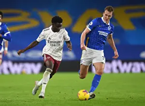 Bukayo Saka vs. Dan Burn: A Tactical Showdown in Arsenal's Clash with Brighton, Premier League 2020-21