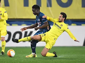 Villarreal V Arsenal 2020-21 Prints: Bukayo Saka vs Dani Parejo: A Europa League Semi-Final Battle at Villarreal's Estadio de la Ceramica
