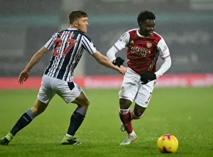 West Bromwich Albion V Arsenal 2020-21 Prints: Bukayo Saka vs. Dara O'Shea: A Premier League Battle at The Hawthorns - Arsenal vs