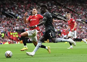 Bukayo Saka vs Diogo Dalot: Intense Battle at Old Trafford - Manchester United vs Arsenal, Premier League 2022-23