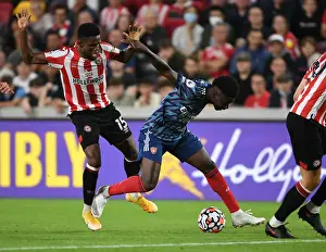 Bukayo Saka vs. Frank Onyeka: Intense Battle at Brentford Community Stadium - Arsenal vs. Brentford, Premier League 2021-22