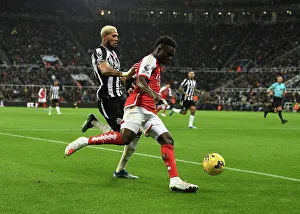 Bukayo Saka vs Joelinton: Intense Battle at St. James Park - Arsenal vs Newcastle United, Premier League 2023-24