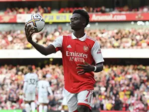 Arsenal V Liverpool 2022-23 Prints: Bukayo Saka vs. Liverpool: Arsenal's Star Forward Battles in Premier League Showdown