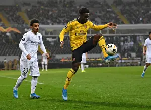 Bukayo Saka vs. Marcus Edwards: A Clash of Skills in Vitoria Guimaraes vs. Arsenal, UEFA Europa League, 2019