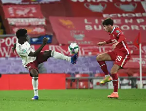 Liverpool V Arsenal - Carabao Cup 2020-21 Prints: Bukayo Saka vs. Neco Williams: Empty Anfield Rivalry - Carabao Cup 2020-21