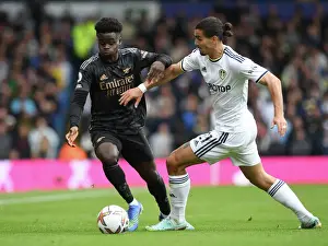Leeds United V Arsenal 2022-23 Prints: Bukayo Saka vs. Pascal Struijk: Battle at Elland Road - Leeds United vs