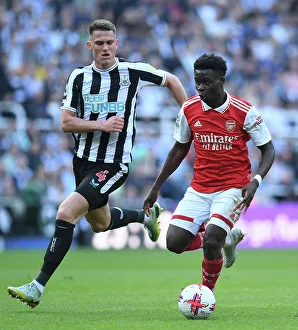 Bukayo Saka vs Sven Botman: Intense Battle at St. James Park - Arsenal vs Newcastle, Premier League 2022-23