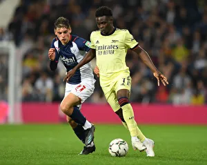 West Bromwich Albion V Arsenal - Carabao Cup 2021-22 Prints: Bukayo Saka vs. Tom Fellows: Arsenal's Star Clashes in Carabao Cup Showdown