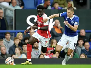 Everton V Arsenal 2023-24 Prints: Bukayo Saka vs Vitaliy Mykolenko: Intense Battle at Goodison Park - Everton vs Arsenal
