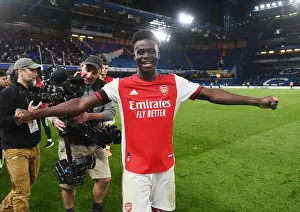 Bukayo Saka's Euphoric Celebration: Arsenal's Thrilling Victory over Chelsea in the Premier League (2021-22)