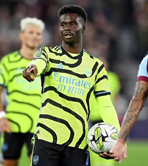 West Ham United V Arsenal - Carabao Cup 2023-24 Prints: Bukayo Saka's Reaction: Arsenal vs. West Ham United in Carabao Cup Fourth Round
