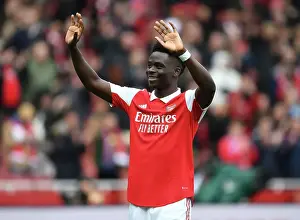 Arsenal V Crystal Palace 2022-23 Prints: Bukayo Saka's Triumphant Moment: Arsenal Star Celebrates Epic Victory Over Crystal Palace with Adoring Fans