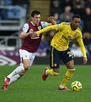 Burnley v Arsenal 2019-20 Collection: Burnley vs. Arsenal: Clash between Joe Willock and Jack Cork in the Premier League