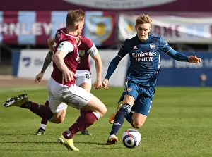 Burnley V Arsenal 2020-21 Prints: Burnley vs. Arsenal: Martin Odegaard Faces Off Against Charlie Taylor Amidst Empty Turf Moor