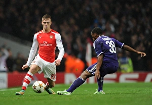 Arsenal v Anderlecht 2014/15 Collection: Calum Chambers (Arsenal) Andy Kawaga (Anderlecht). Arsenal 3: 3 Anderlecht. UEFA Champions League