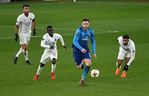 Arsenal V Östersunds FK 2017-18 Prints: Calum Chambers vs. Frank Arhin: Clash in the Europa League between Arsenal and Östersunds FK